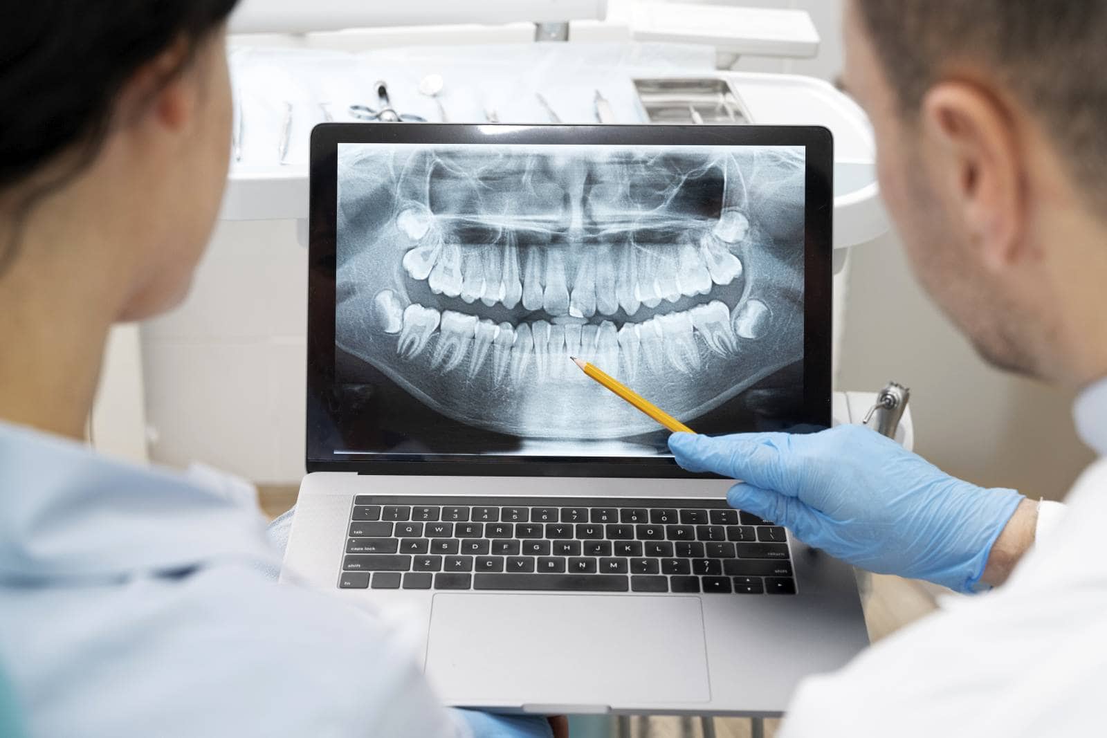 dentist doing check up patient