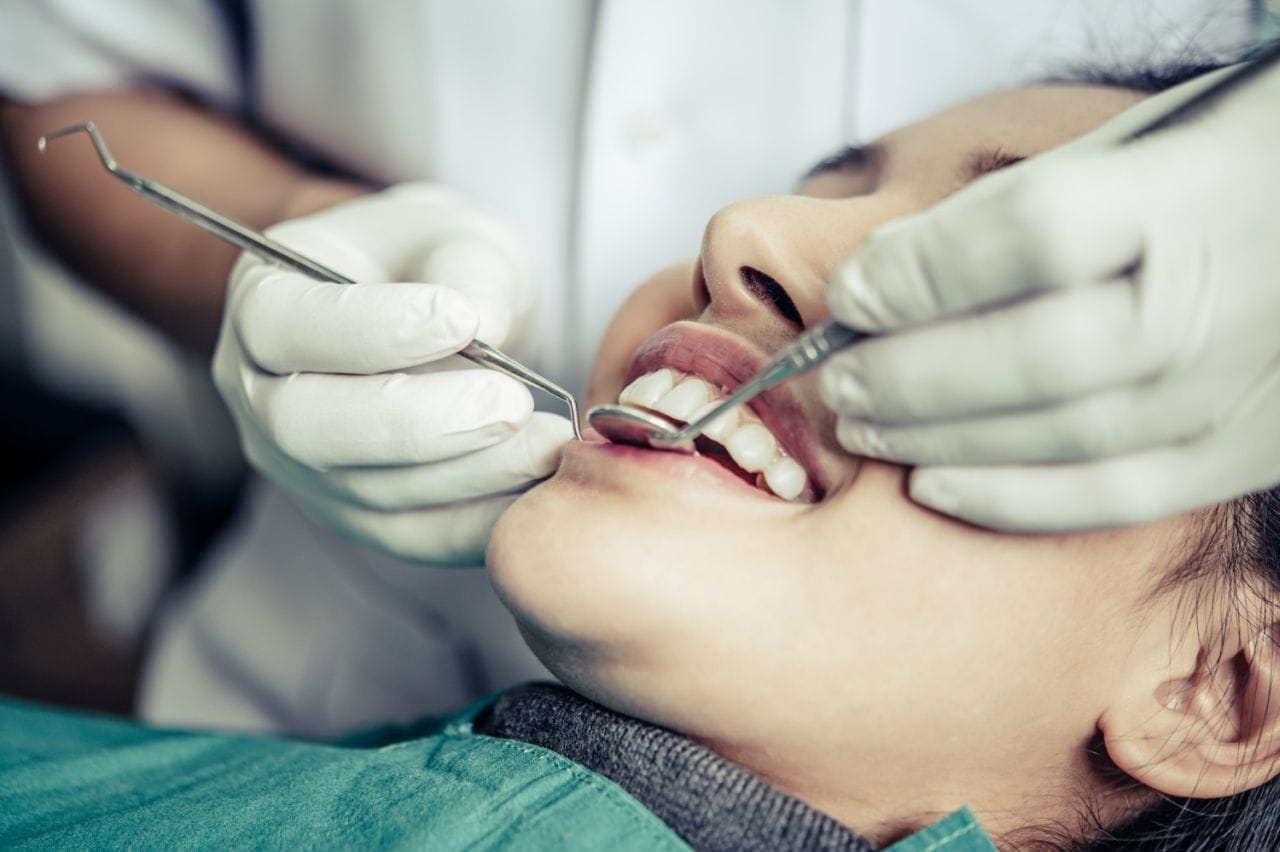 dentists treat patients teeth (1)