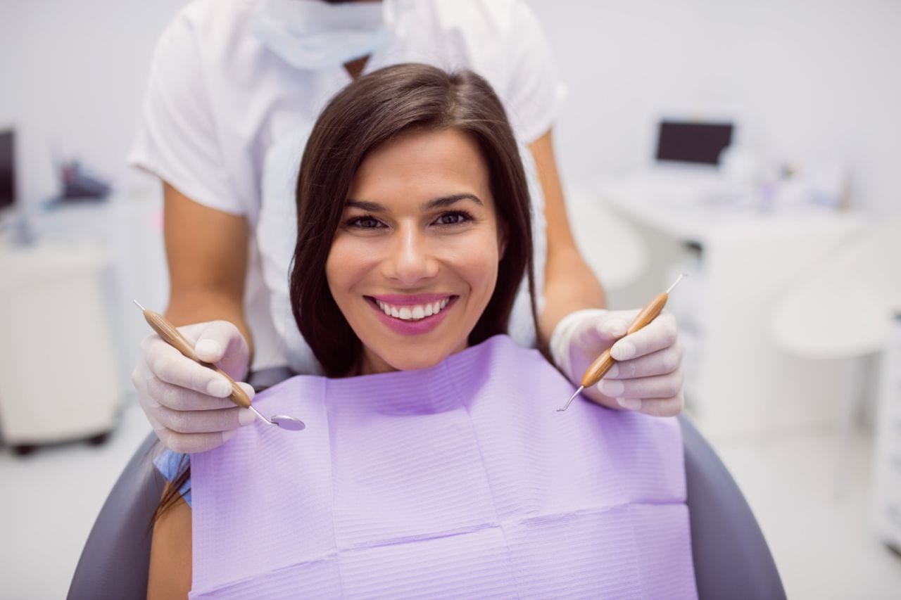 female patient smiling clinic